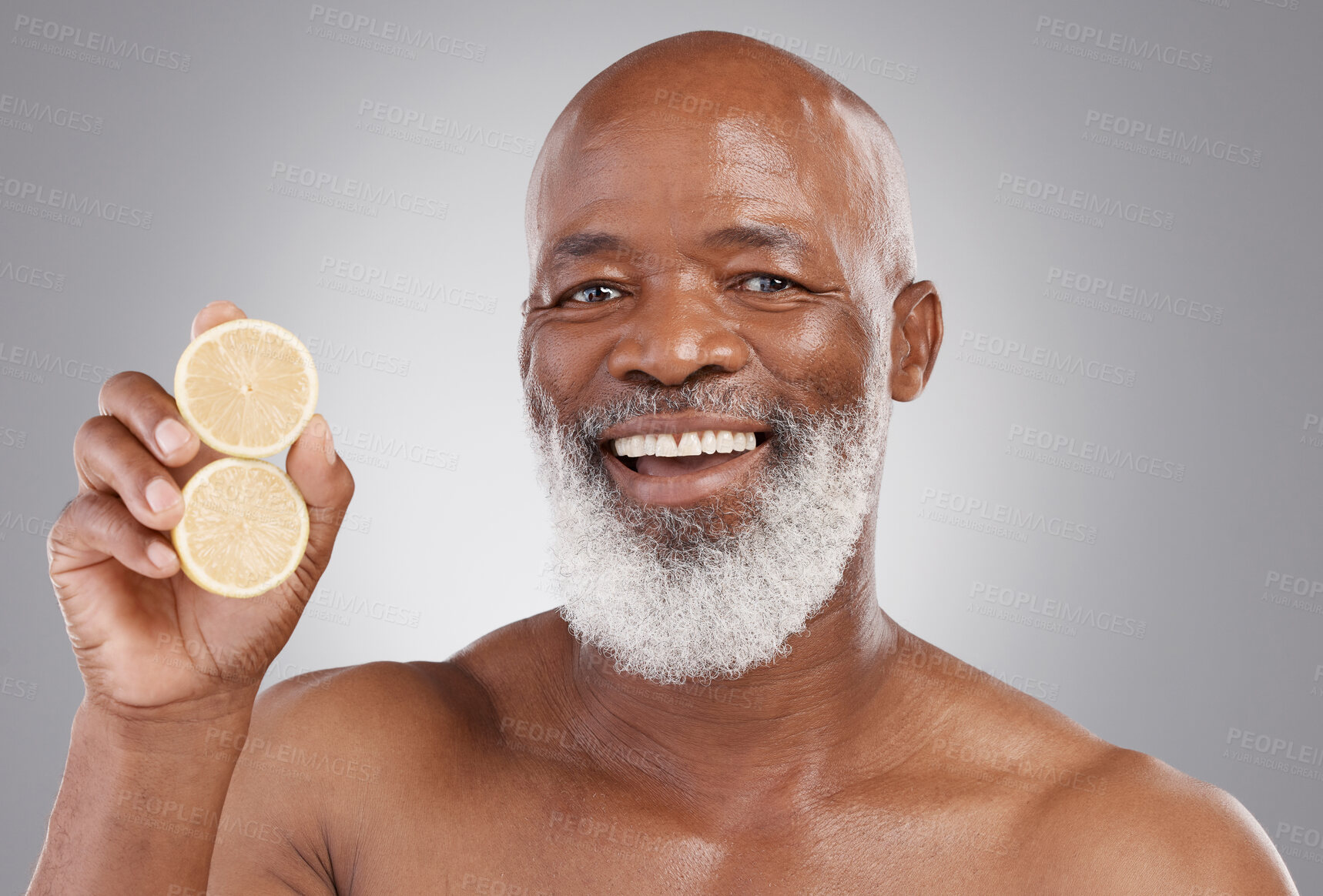 Buy stock photo Senior black man, portrait smile and fruit for vitamin C, skincare or natural nutrition against gray studio background. Happy African American male and citrus lemon for healthy skin, diet or wellness