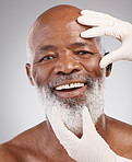 Skincare, gloves and portrait of black man with smile, happiness and professional anti ageing spa treatment.  Dermatology, cosmetics and happy, mature model with skin care at plastic surgery clinic.