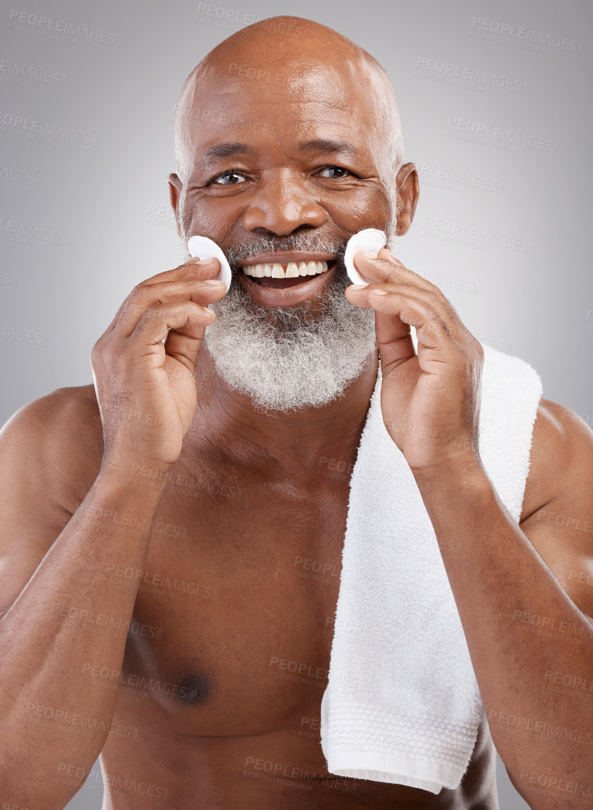 Buy stock photo Skincare, portrait and cleansing pad for man with smile, happiness and grooming with anti ageing facial treatment.  Dermatology, cleaning and happy, mature and African model with cotton pads in hands