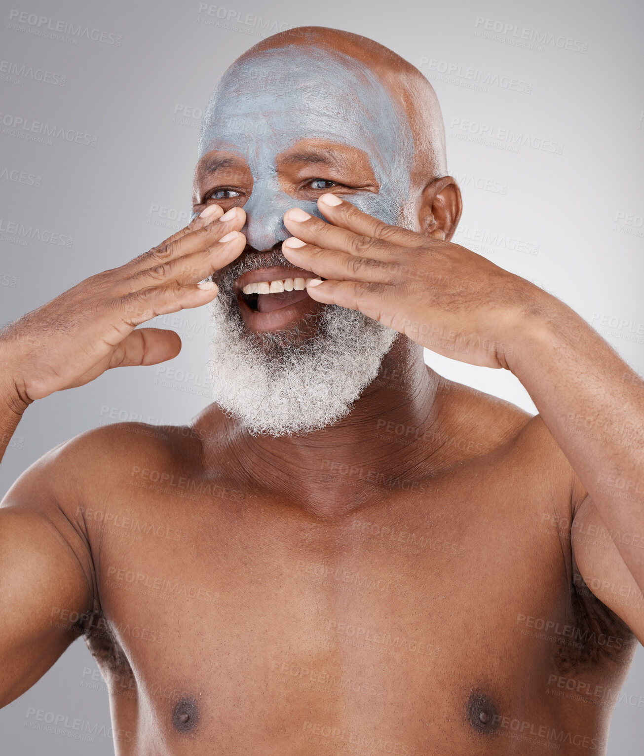 Buy stock photo Cosmetics, skincare and man with face mask, beauty and grooming against a studio background. Senior male, elderly person and happy guy with morning routine, treatment and clear skin with dermatology