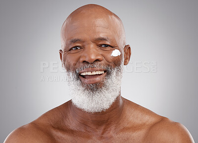 Buy stock photo Skincare, cream and portrait of senior black man in studio for wellness, cosmetics and facial creme. Dermatology, beauty and face of happy guy with anti aging lotion, wrinkle treatment or moisturizer