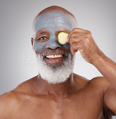 Buy stock photo Face mask, cucumber and black man with smile in portrait, beauty and skincare isolated on studio background. Happy senior male, cosmetics and healthy skin, anti aging cosmetic routine with facial