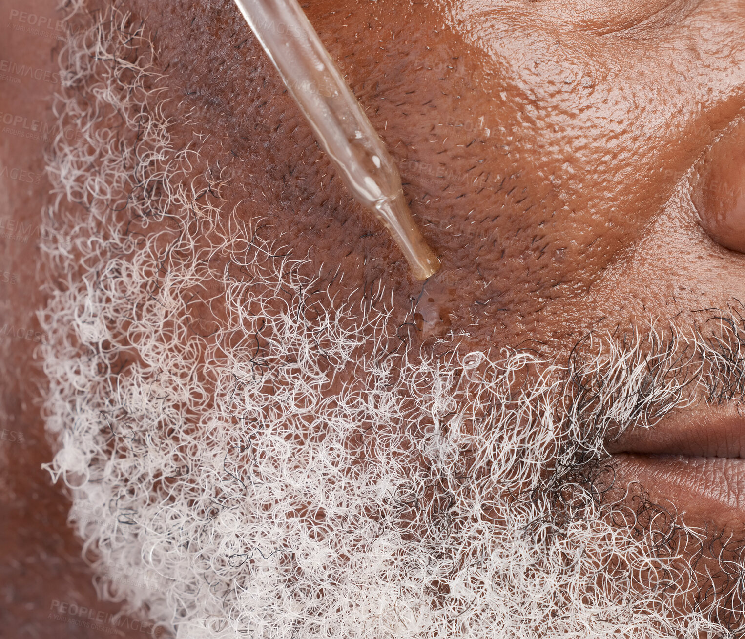 Buy stock photo Skincare, serum and face of senior man in studio for wellness, cosmetics and facial hair care. Dermatology, beauty and closeup of male person with oil dropper for anti aging, wrinkles and grooming