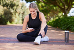 Relax, phone and fitness with woman in park for social media, network and technology. Running, workout and training with female runner in nature for connection, communication and connection