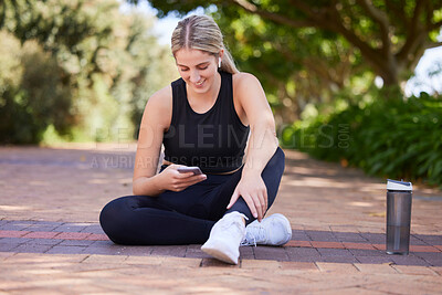 Buy stock photo Relax, phone and fitness with woman in park for social media, network and technology. Running, workout and training with female runner in nature for connection, communication and connection