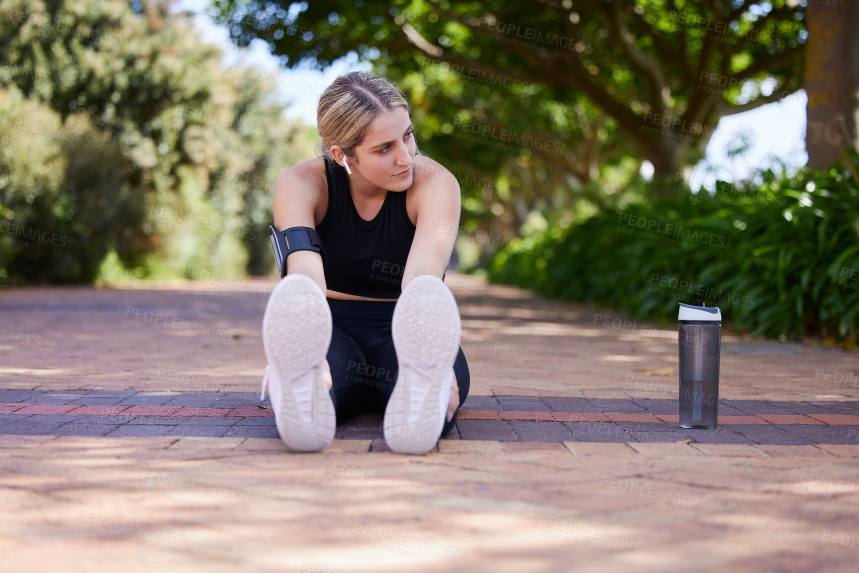 Buy stock photo Fitness, legs and woman stretching before exercise, workout or training outdoors for health and wellness. Sport, healthy and female athlete or person ready to start for performance run or marathon