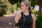 Headphones, runner or side of woman in park training, exercise or workout for a healthy body. Wellness, fitness profile or sports girl athlete exercising or streaming audio or radio song in nature