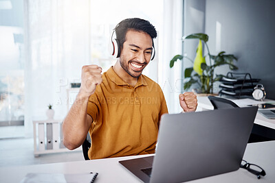 Buy stock photo Business man, laptop and success with headphones to listen to music, audio or video call. Asian male entrepreneur at desk with a smile and hands to celebrate achievement, online target or goals