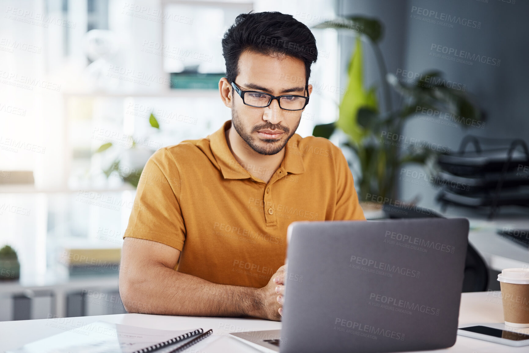 Buy stock photo Focus, laptop and business man with online data analytics, market research and social media review in office. Serious, planning and analyst or asian person on computer for company website management