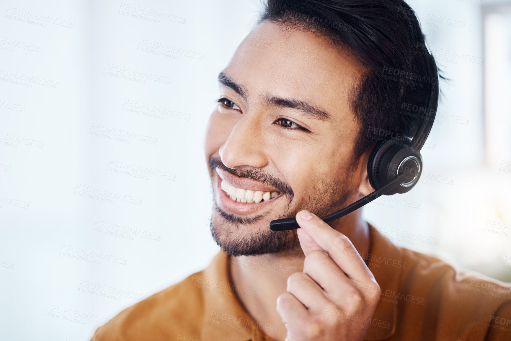 Buy stock photo Asian man, call center and smile with headphones for customer service, consulting or support at office. Happy male consultant or agent smiling in telemarketing with headset for online advice or help