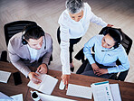 Business people, call center and coaching on computer above in customer service or support at office. Telemarketing coach training staff on desktop in teamwork, collaboration or advice in contact us