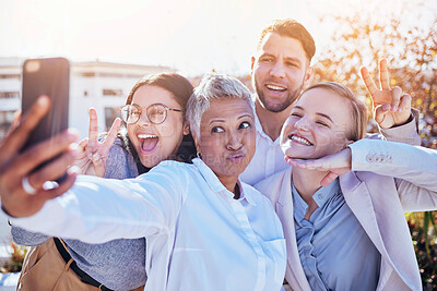 Buy stock photo Selfie, silly group of business people and team building outside office, happy employees at creative start up. Diversity, happiness and smile, man and women in outdoor picture together at workplace.