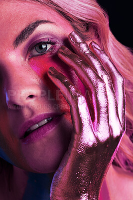 Buy stock photo Woman, art portrait and fantasy in metallic makeup for beauty, futuristic cosmetics and headshot. Girl, model and neon glow with metal paint texture, creativity or shine in studio by black background
