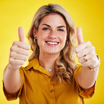 Buy stock photo Portrait, thumbs up and motivation with a woman on a yellow background in studio to say thank you. Face, hands and welcome with an attractive young female model indoors in gesture of emoji or support