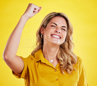 Buy stock photo Woman, fist celebration and happy in studio for winning, goals and success for achievement by yellow background. Girl, excited and winner with bonus, profit and prize from competition by backdrop