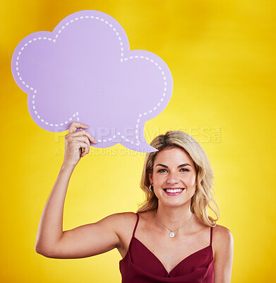 Buy stock photo Portrait, smile and woman with speech bubble for social media in studio isolated on a yellow background. Poster, mockup and happy female person with advertising banner, marketing opinion and voice.