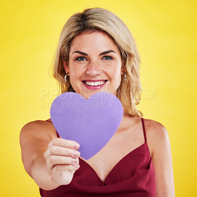 Buy stock photo Portrait, heart and woman with wellness, emoji and happiness against a studio background. Face, female model and happy lady with a symbol for love, sign and support with smile, romantic and care
