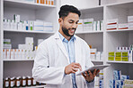 Pharmacy, happy man or doctor typing on tablet medicine or checking medical prescription pills on shelf. Digital or pharmacist with online checklist on clinic shelves or drugstore inventory storage 
