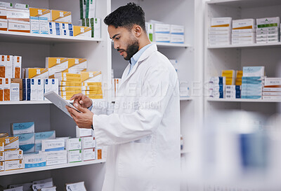 Buy stock photo Pharmacy, man or pharmacist with tablet for research or checking medical prescription on shelf. Digital, healthcare or doctor typing online checklist on clinic shelves or drugstore inventory storage 