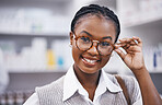 Smile, eyesight and portrait of woman with glasses in clinic for eye exam, health and help with poor sight test. Vision, happy face of girl holding frame from designer eyewear brand and care for eyes