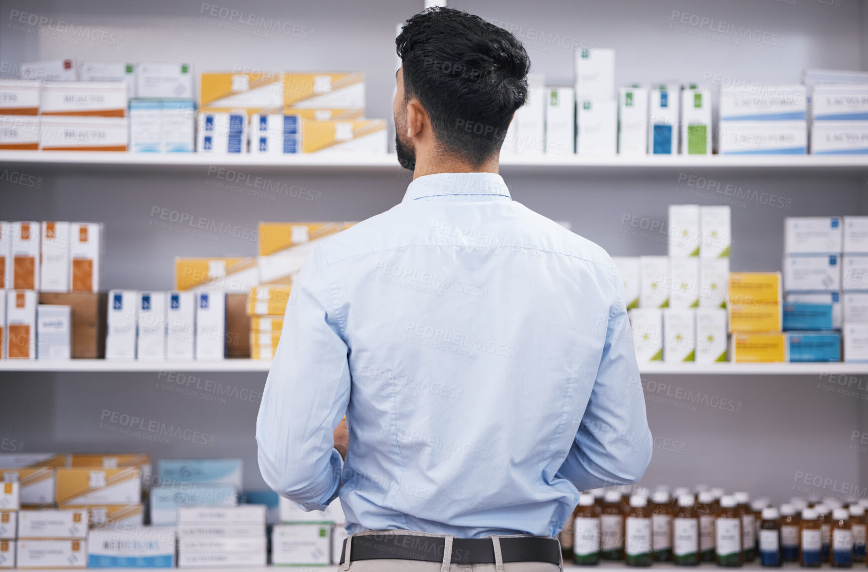 Buy stock photo Pharmacy, medicine and back of man check shelf for medication, prescription and treatment. Healthcare clinic, drug store and male person reading boxes for medical product, supplements and antibiotics