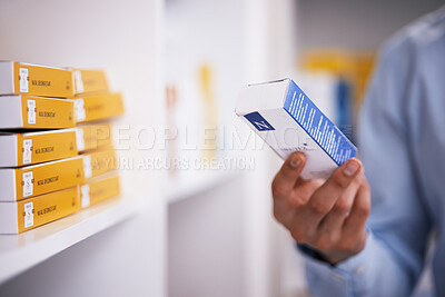 Buy stock photo Pharmacy, medicine and hands of man with pills reading label for medication, prescription and information. Healthcare, clinic and closeup of person with medical product, supplements and antibiotics