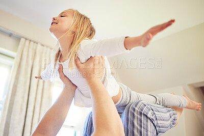 Buy stock photo Playing, airplane and parent with daughter in bedroom for bonding, support and happiness. Smile, relax and weekend with young girl playing in family home for freedom, morning and wake up
