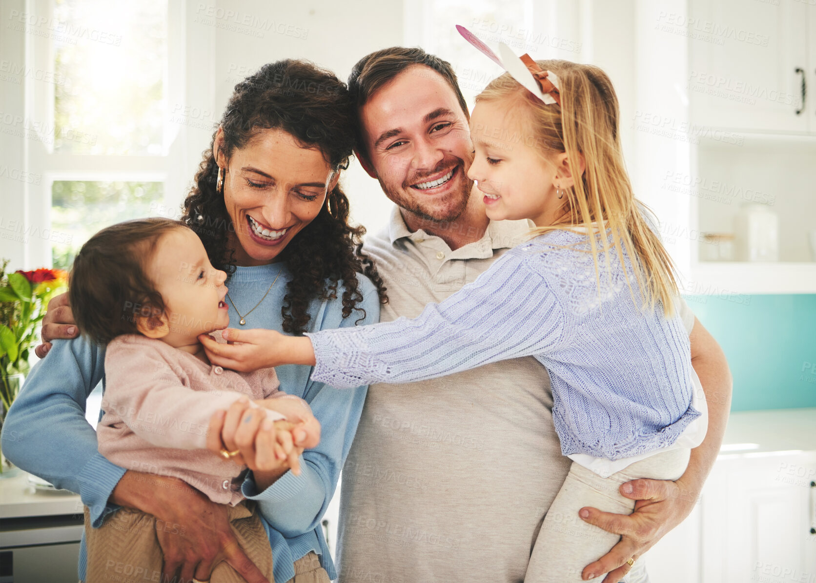 Buy stock photo Mother, father and children portrait in a happy family home while together for love, support and care. Woman, man or parents with girl kids playing in a house for quality time, bonding and to relax