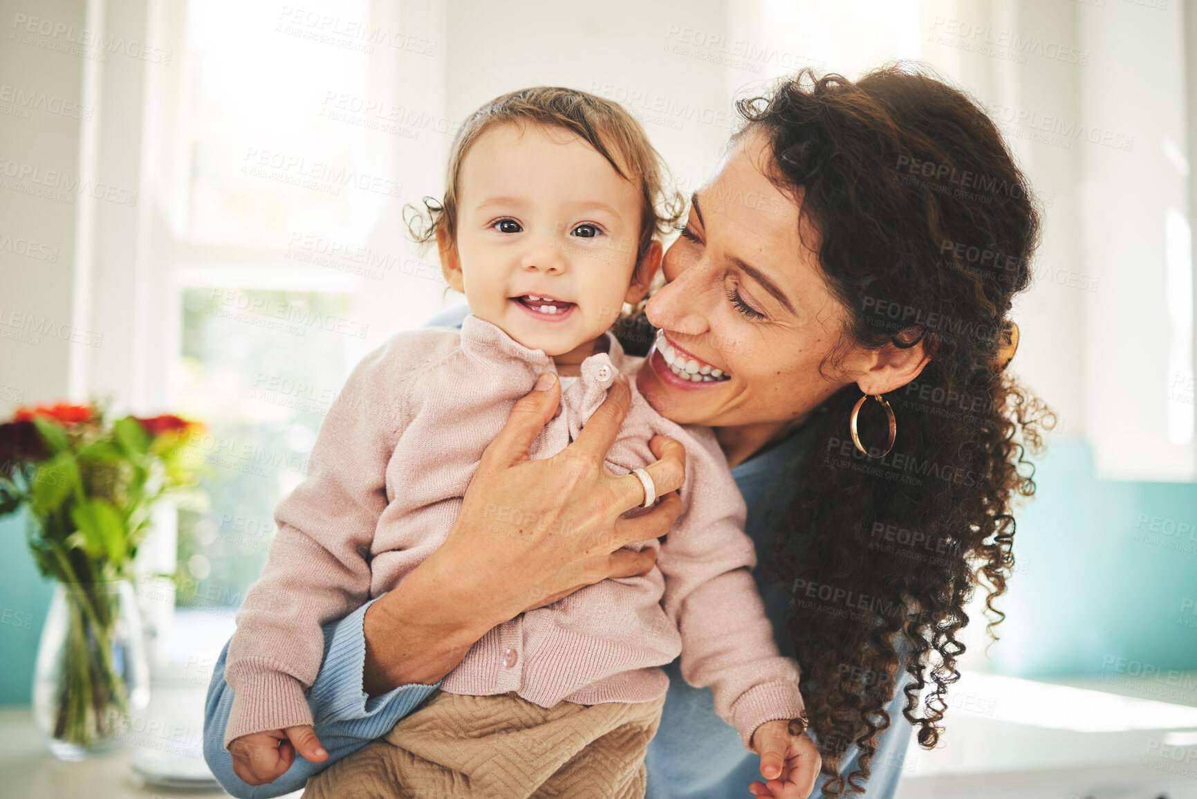 Buy stock photo Mother, baby and happiness portrait with a hug in a family home while together for love, support and care. Woman or mom and girl child with a smile on face for quality time, bonding and to relax