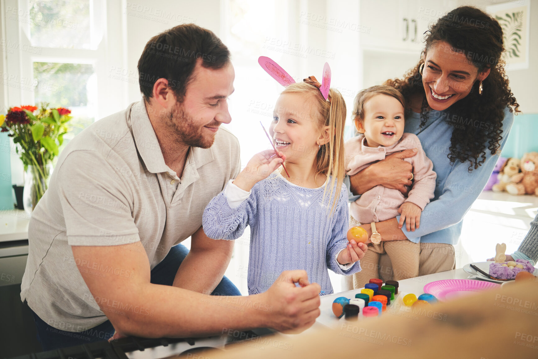 Buy stock photo Easter, family and painting eggs with kids learning to be creative on table or color brush at home. Children, mother and happy father decorating together or mom with dad teaching young girl art. 