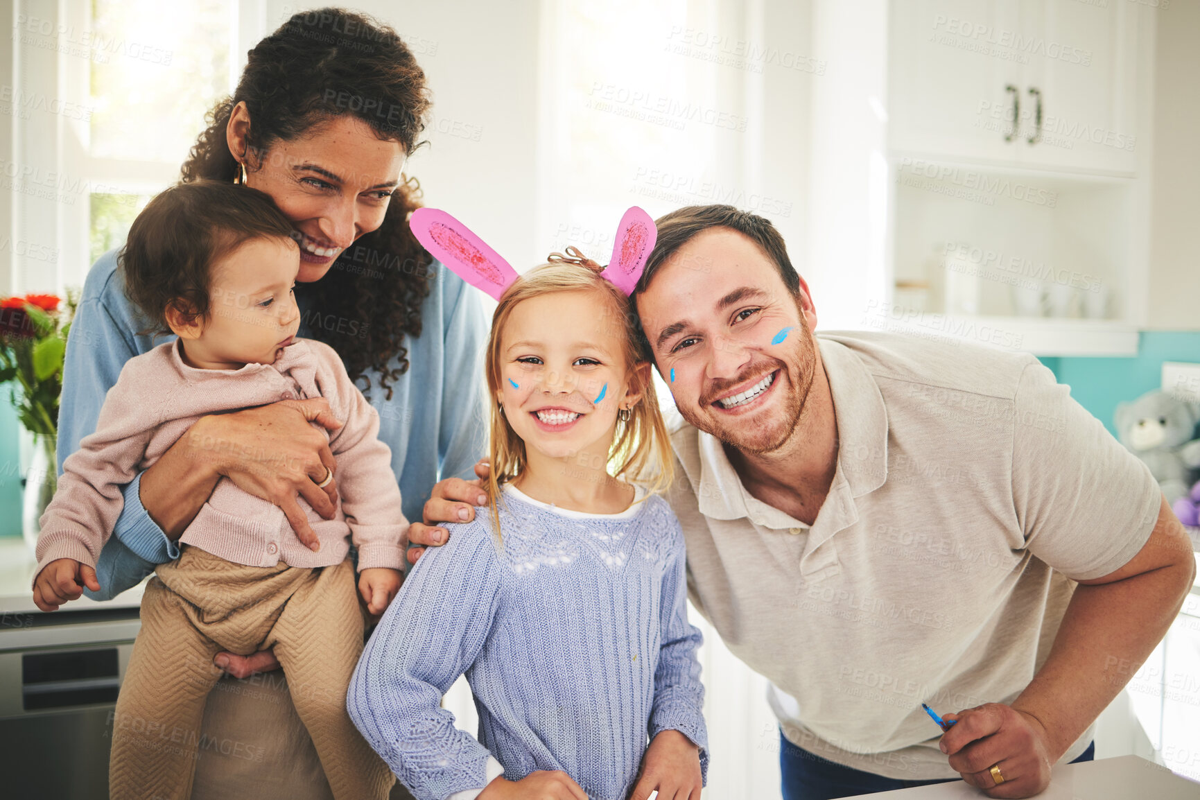 Buy stock photo Parents, girl children and bunny ears in portrait in family home with love, baby or happiness for easter. Man, woman and kids in house, laughing and excited for holiday with love, care and bonding