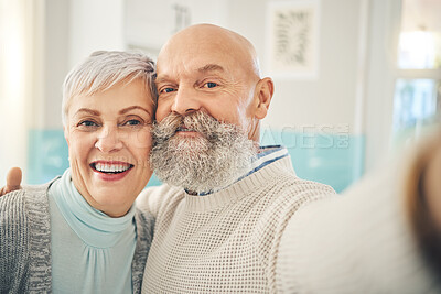 Buy stock photo Selfie, love and a senior couple in their home together, posing for a social media profile picture together. Photograph, portrait or face with an elderly man and woman posting a status update online