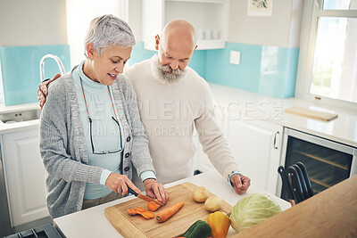 Buy stock photo Cooking, food and an old couple in the kitchen of their home together during retirement for meal preparation. Health, wellness or nutrition with a senior man and woman making supper in their house