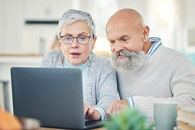 Buy stock photo Laptop, senior couple and typing in home, internet browsing or social media in house. Computer, retirement and man and woman reading email, news or streaming video, movie or film together online.