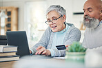 Laptop, elderly couple and credit card in home for online shopping, digital banking or payment. Computer, ecommerce and happiness of man and woman on internet for sales, retirement finance or fintech