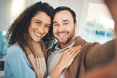 Buy stock photo Happy couple, home and selfie with hug, portrait and social network post for love, together and excited. Young man, woman and photography for profile picture with care, happiness and blog on internet