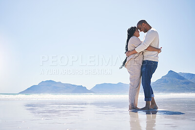 Buy stock photo Love, hug and mockup with a couple on the beach for romance, dating or summer vacation together. Travel, ocean or view with a man and woman hugging while standing together on a coastal seashore