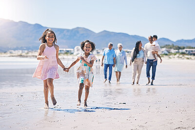 Buy stock photo Children running, family bonding and happy at the beach for travel, morning walking and holiday. Smile, summer and girl siblings holding hands on a walk at the ocean with parents and grandparents