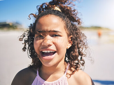 Buy stock photo Child, beach and portrait in nature with a young girl and smile on summer holiday. Face, closeup and African female child at the sea on vacation feeling happy from the ocean and outdoor fun in sun