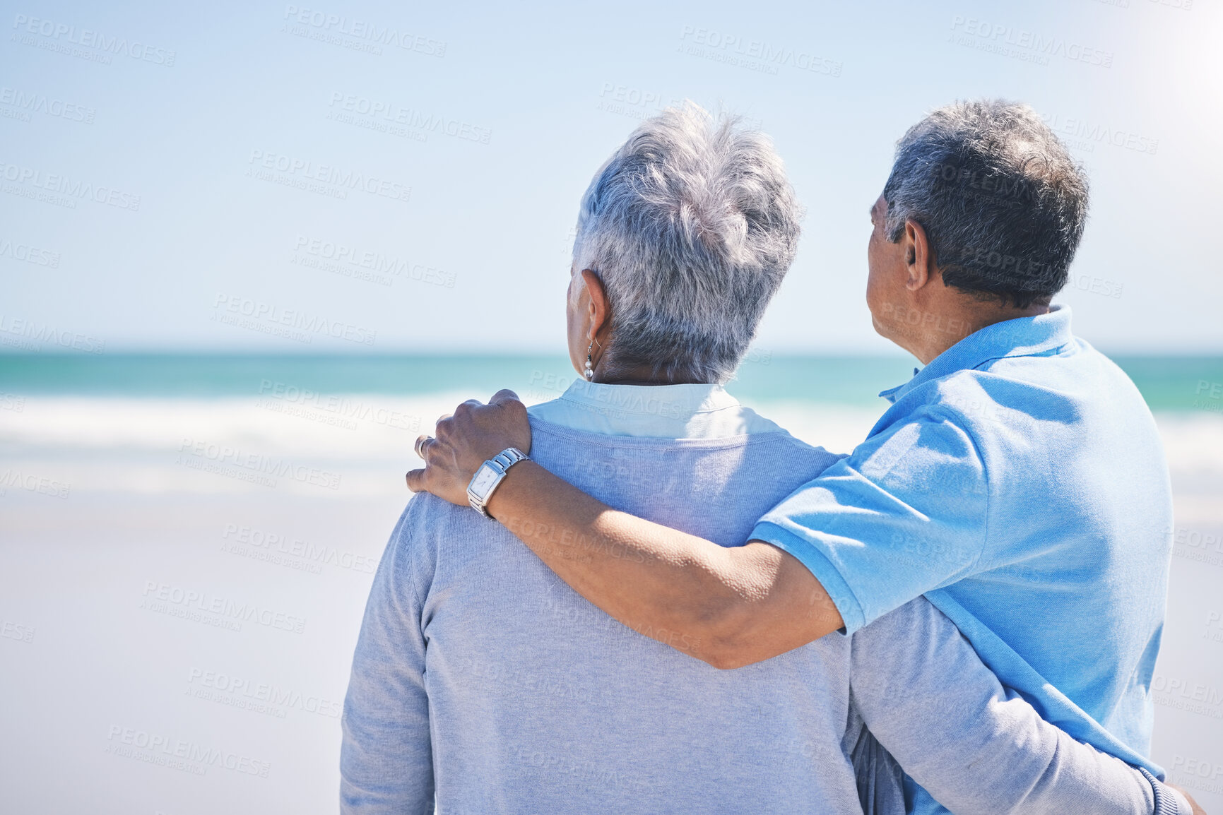 Buy stock photo Love, back and senior couple on a beach, hug and bonding for relationship, summer holiday and marriage. Romance, partners or old woman, elderly man and embrace on seaside vacation and loving together