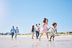 Family, beach and children running with space for mockup in summer for adventure, love and travel together. Men, women and girl kids by ocean with parents, grandparents and mock up with blue sky