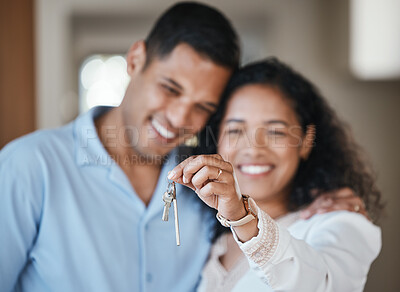 Buy stock photo House keys, new home or happy couple hug in real estate, property investment or buying an apartment. Blurred, love or Indian man hugging an excited woman to celebrate goals or moving in together 