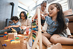 Education, toys and grandparents with children on floor for playing, educational games and learning. Child development, family and happy grandpa, grandma and kids for quality time, bonding and love
