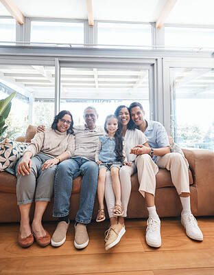 Buy stock photo Big family in portrait with parents, grandparents and child on sofa in new house, happiness and quality time. Happy people, women and men with kid on sofa to celebrate property investment with smile.