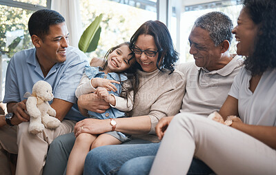 Buy stock photo Big family, parents and girl with teddy bear on sofa, grandparents and tickle for game in home living room. Men, women and female child with toys, love and bonding on lounge couch in house on holiday