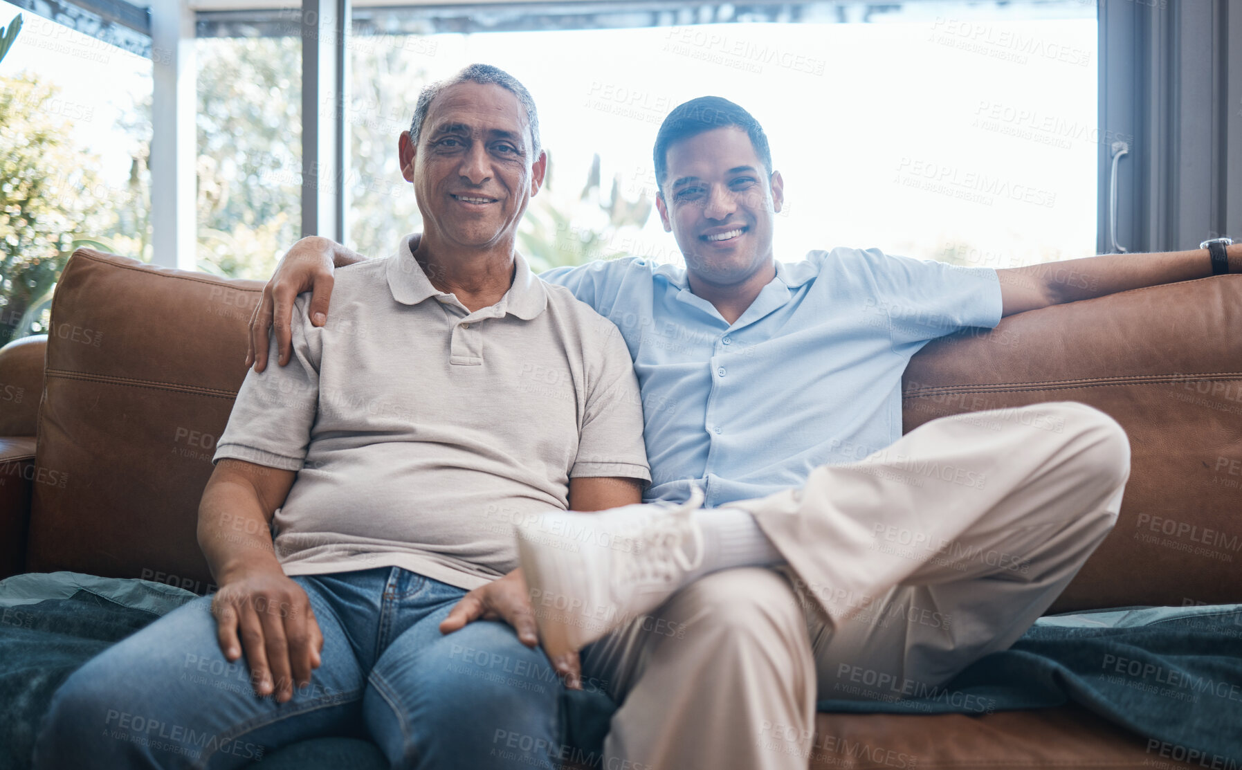 Buy stock photo Portrait of happy man with senior father on sofa, happiness and quality time together in living room of home in Mexico. Love, support and men on couch in lounge with smile, dad and adult son in house