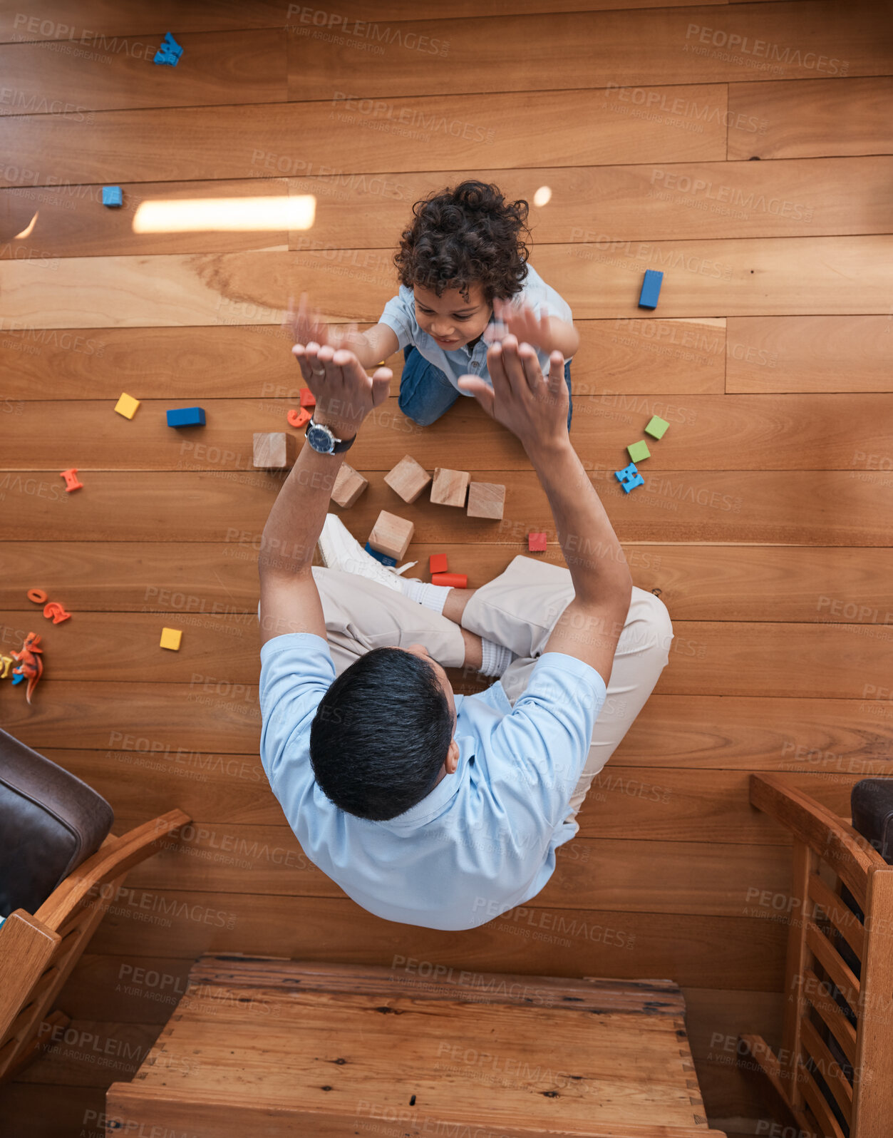 Buy stock photo High five, toys and top view of father with baby on floor for playing, educational games and learning. Child development, family and above of happy dad and young boy for celebration, bonding and love
