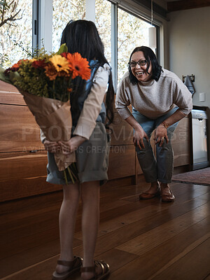 Buy stock photo Surprise flowers, gift and a mother and child for mothers day, birthday or gratitude for care. Love, smile and a girl kid hiding a floral bouquet from mom for celebration, special event or happiness