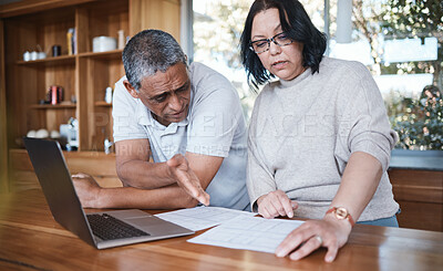 Buy stock photo Mature couple, finance and stress of debt in home for anxiety, insurance planning or mortgage bills. Frustrated man, woman and bankruptcy of financial crisis, poor savings policy or inflation problem