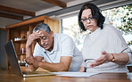 Mature couple, debt and stress of budget in home with anxiety, planning money and mortgage bills. Frustrated man, woman and overwhelmed with documents, taxes and financial crisis of inflation problem